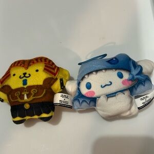 Yu-Gi-oh/Hello Kitty Blue and White Plush toys.